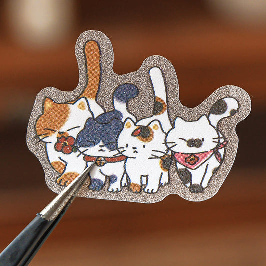 Detail shot of playful kitten sticker