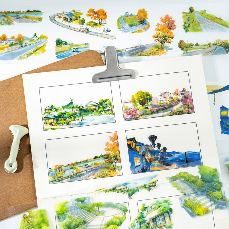 Flat lay of seasonal PET tape roll showing four landscape patterns