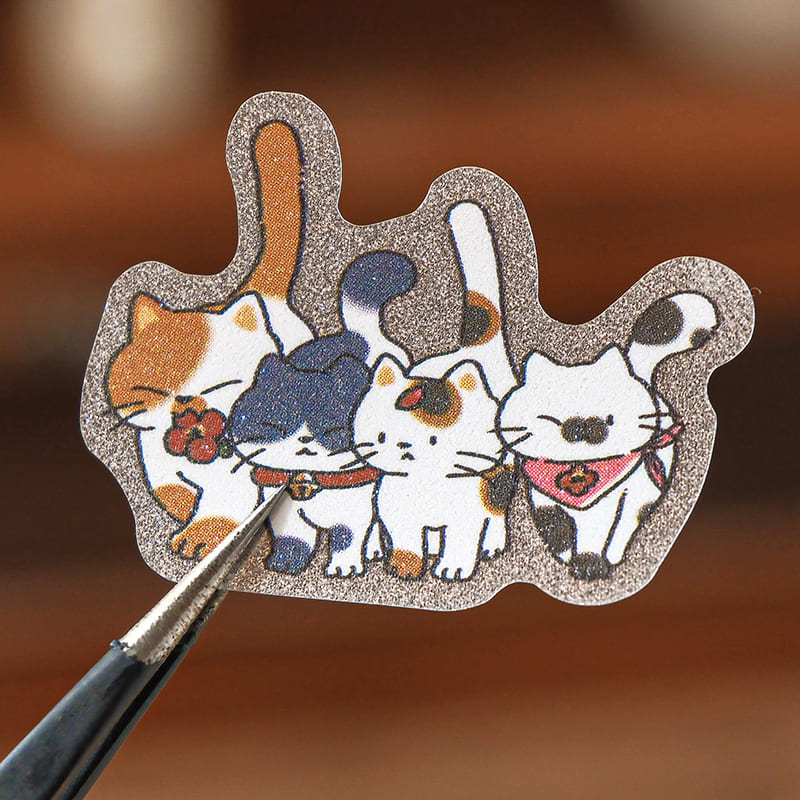 Detail shot of playful kitten sticker