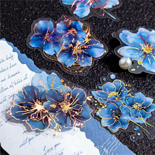Close-up of gold foil floral sticker – elegant design for journals, planners, and scrapbooks.