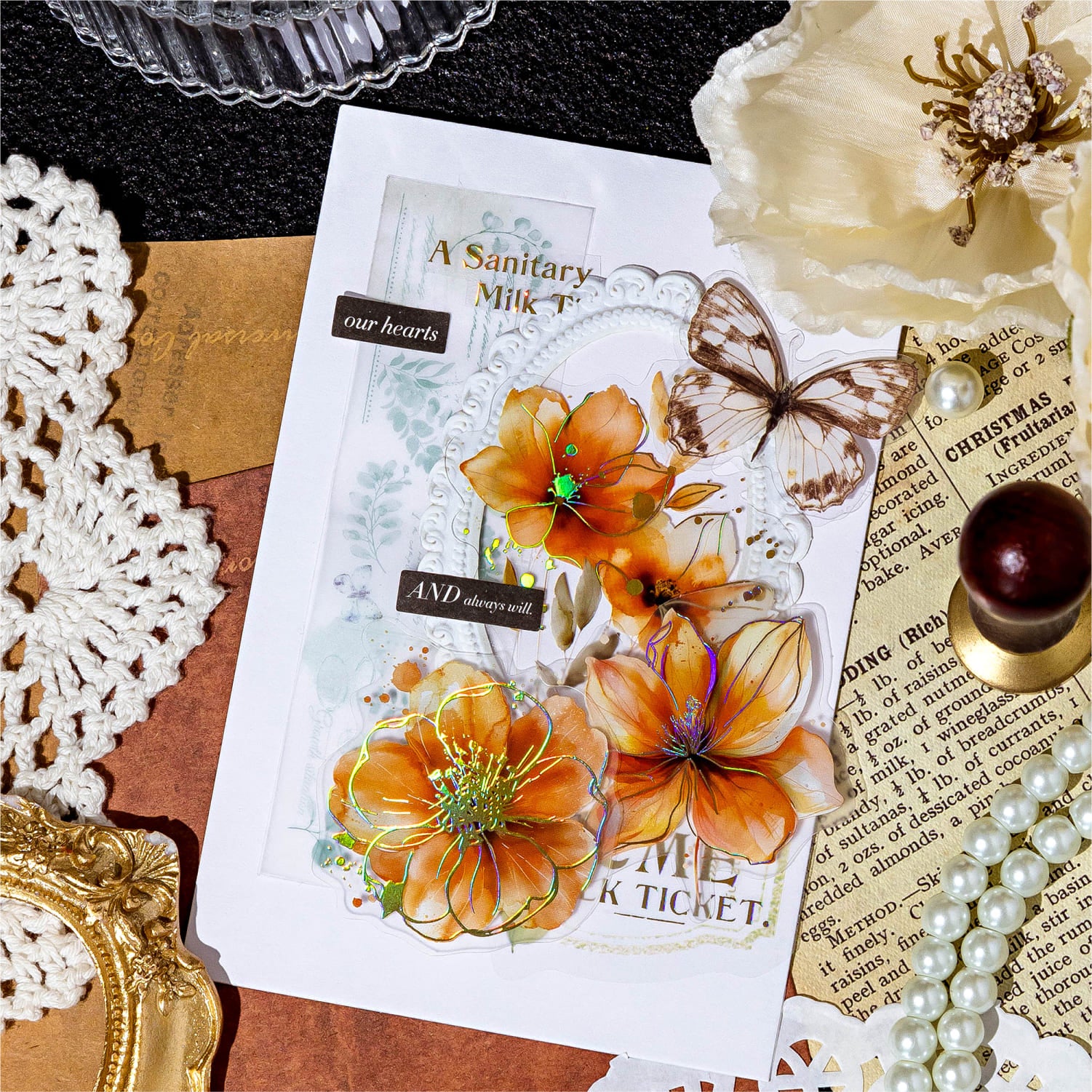 Gold foil floral sticker on journal cover – chic embellishment for personal notebooks.
