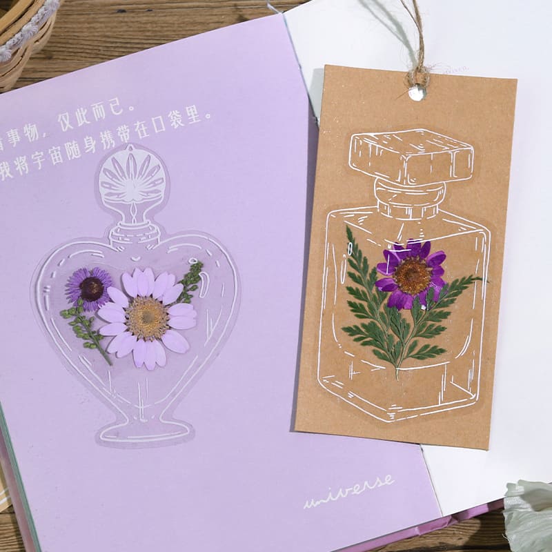 Creative layering with bottle stickers in journal