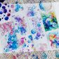One Cycle PET Tape flat lay showing watercolor bubble gradient