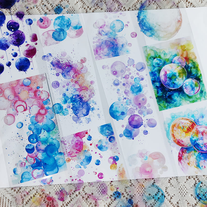 One Cycle PET Tape flat lay showing watercolor bubble gradient